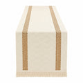 Chemin de table beige à franges avec motifs géométriques