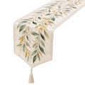 Chemin de table feuillage crème, vert et doré avec pompons